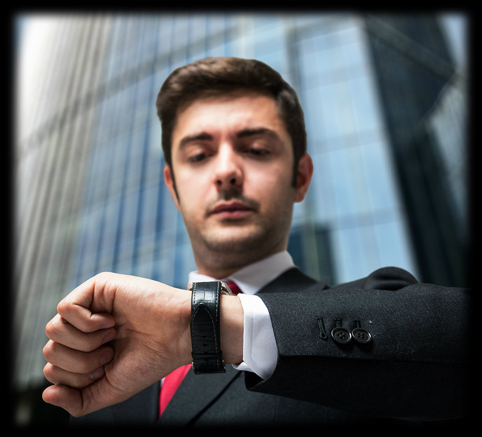 businessman looking at his watch