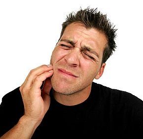 Man in pain in need of an emergency dentist