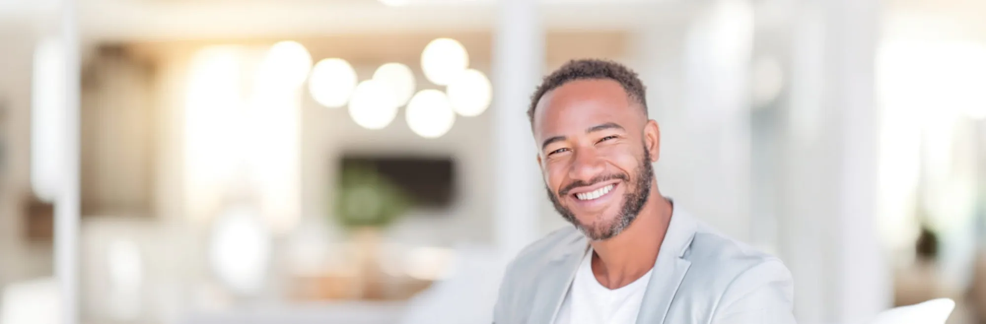 Smiling man with a healthy white smile